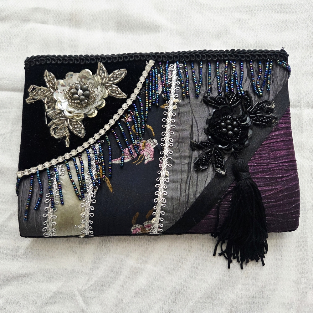Elegant Black and Purple Embellished Clutch